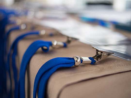 Delegate Lanyards prepared at an event registration table